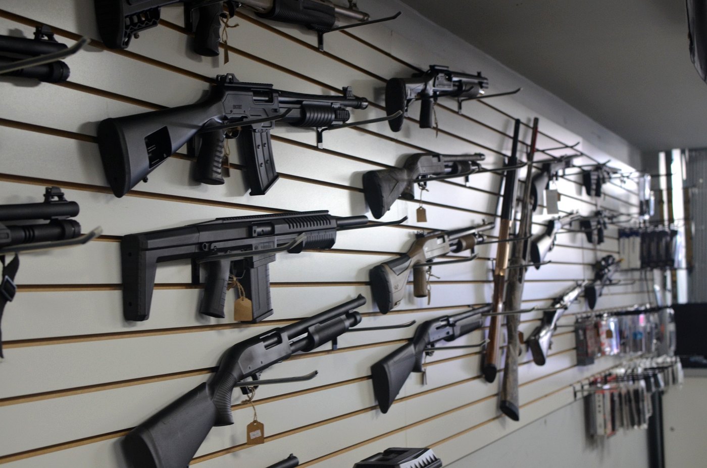 Firearms displayed on the wall at Glen Cove Armory.